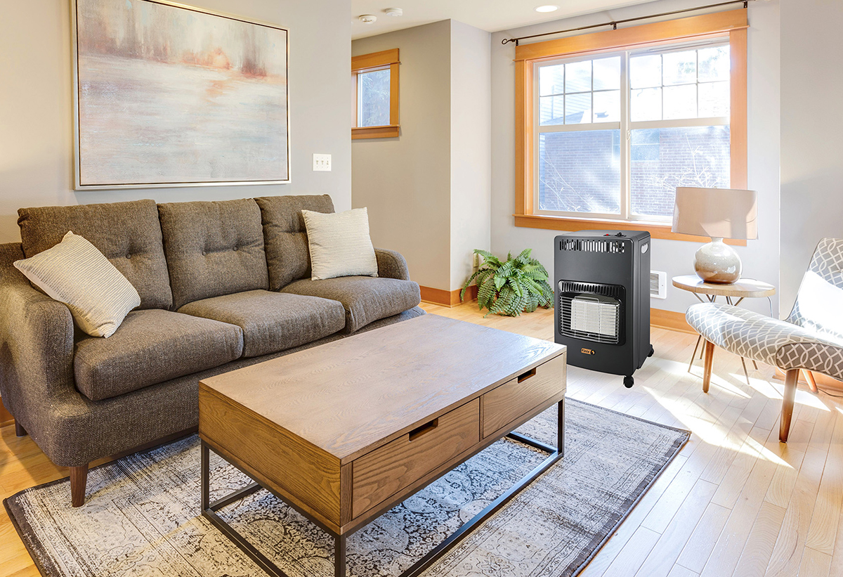 Απεικονίζεται η σόμπα σε σαλόνι.